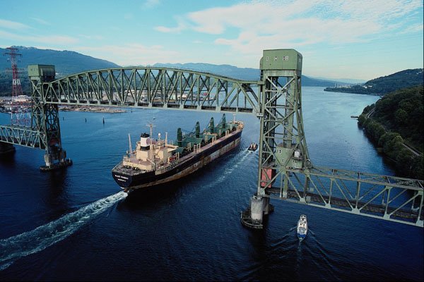 491092 Ship Passing Under Lift Bridge A4 Photo Print