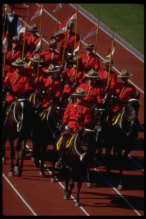 493014 RCMP Marching In Opening Ceremonies, Canada A4 Photo Print