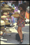 494001 Girl Choosing A Sun Hat, Paphos, Cyprus A4 Photo Print