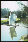 494044 Woman In Flowing White Gown On Stone In Stream A4 Photo Print