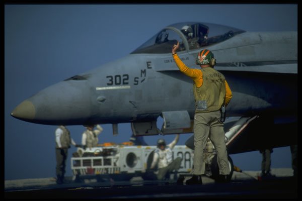 496019 Catapult Officer Launching An FA 18 A4 Photo Print