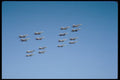 496055 Sixteen FA 18 Hornets Fly By Carriers In Formation A4 Photo Print