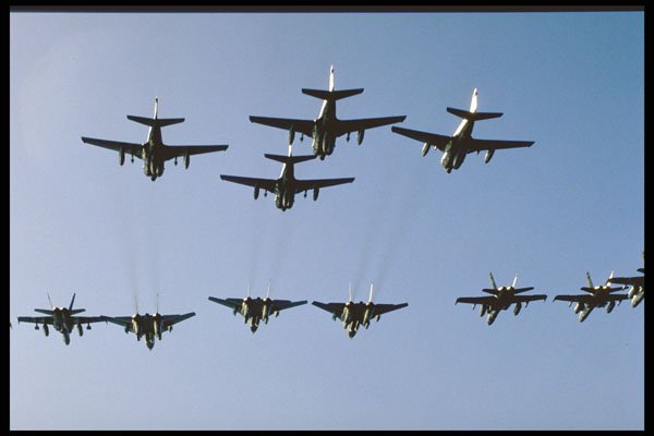 496074 F 14s, A 6s And F 18s Fly Overhead A4 Photo Print