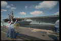 496099 Two Sailors Greet The USS Ranger As It Docks In San Diego A4 Photo Print