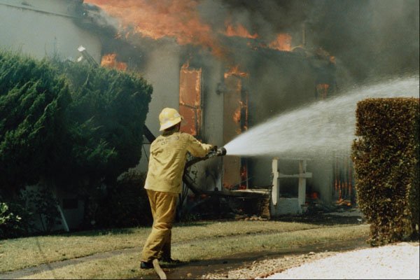 505048 Fire Fighter On Quick Attack At Major Residential Fire A4 Photo Print