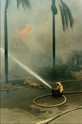 505049 Fire Fighter Directing Hose On Burning Home, Canyon Fire A4 Photo Print