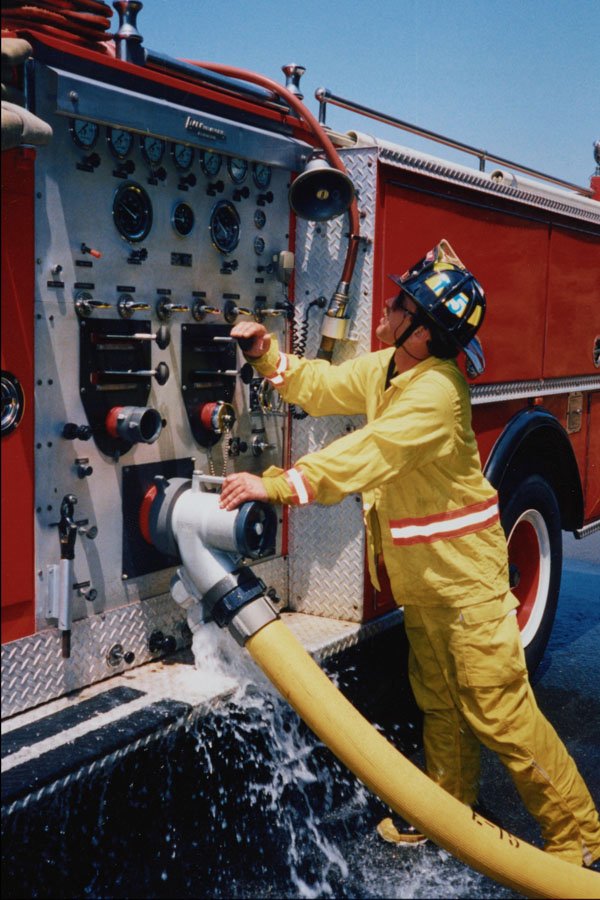 505085 Engineer Adjusting Flow Rate To Hose Lines At Canyon Fire A4 Photo Print