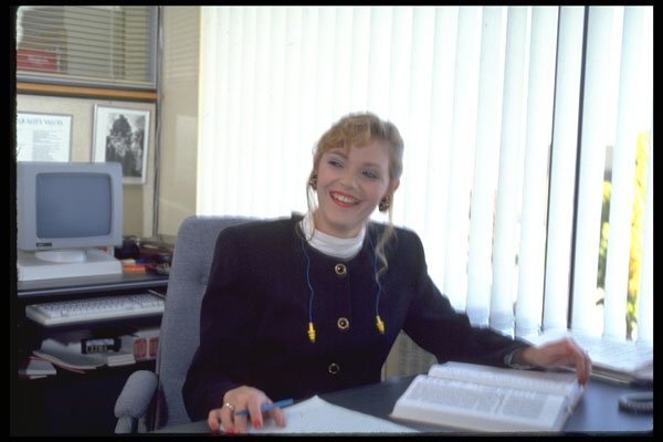 506000 Woman At Office Desk A4 Photo Print