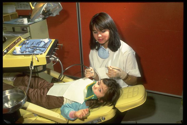506011 Dentist With A Child Patient A4 Photo Print