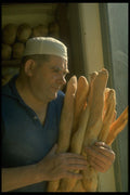 506033 St. Pierre Island Baker In Window Of His Bakery A4 Photo Print
