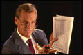 506063 Businessman With Newspaper A4 Photo Print
