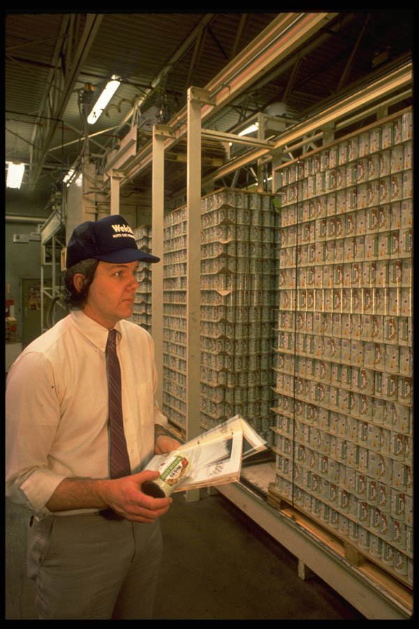 506071 Checking Inventory In A Warehouse A4 Photo Print