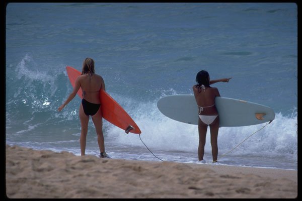 511092 Surfers On Sunset Beach, Hawaii A4 Photo Print
