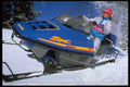 513027 Snowmobile And Girl, Colorado A4 Photo Print