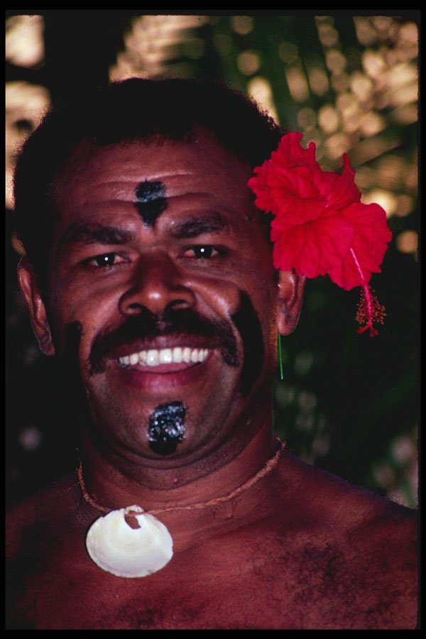 515013 Man With Hibiscus Flower, Fiji A4 Photo Print