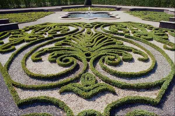 517036 Hedge Ornament In The Big Garden, Light hearted Piece A4 Photo Print