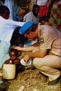 518092 Russian UNAMIR Soldier With A Baby In Rwandan Refugee Camp A4 Photo Print