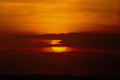 520059 Sun Setting Through Clouds A4 Photo Print
