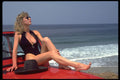 527031 Diana Seated On A Red Jeep Wearing A Low cut Black Swimsuit A4 Photo Print