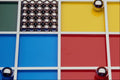 529099 Steel Balls And Rods On Multicolored Acrylic A4 Photo Print