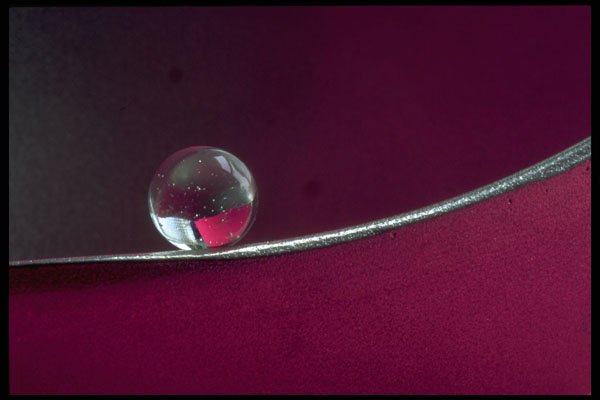 530037 Marble On Metal Rim A4 Photo Print