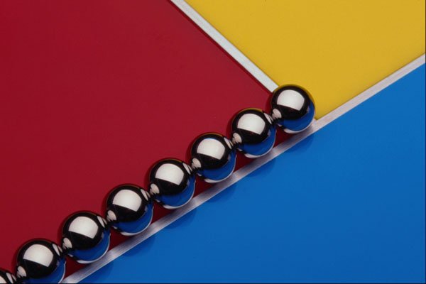 530098 Steel Balls And Rods On Multicolored Acrylic A4 Photo Print