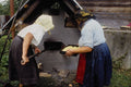 534087 Traditional Farmyard, Baking Sweet Bread, Hoteni, Romania A4 Photo Print