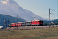 543026 St. Moritz Chur Train Leaving Celerina, Switzerland A4 Photo Print