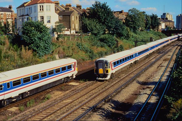 543056 Wessex Electrics Pass Near Clapham Junction, London A4 Photo Print
