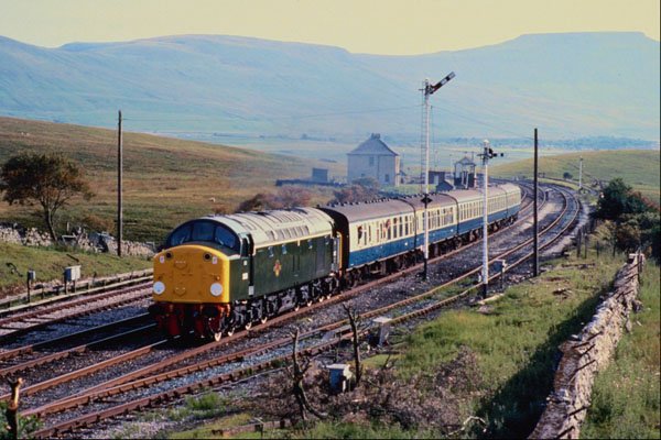 543057 D200 Passes Blea Moor With A Leeds To Carlisle Train, U.K. A4 Photo Print