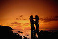 544098 Couple At Sunset On Beach A4 Photo Print