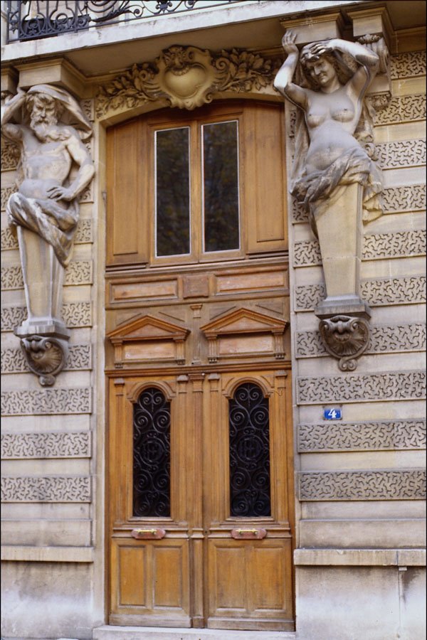 549066 Wooden Door With Statue On Each Side A4 Photo Print