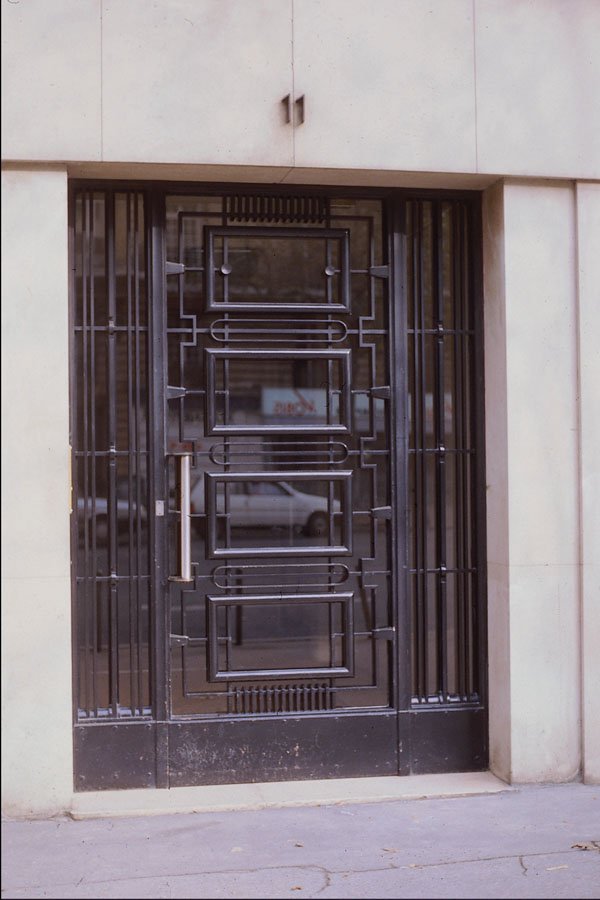 549072 Glass Door With Vertical Metallic Structure A4 Photo Print