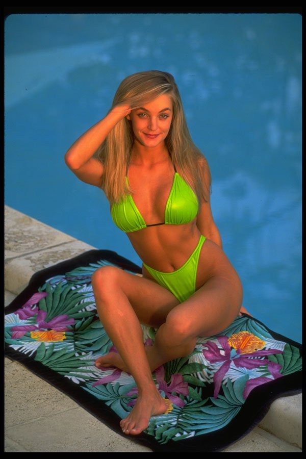 553002 Passenger In Lime green Bikini At Poolside A4 Photo Print