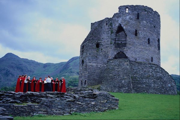 557009 Choir Performing At Dolbadarn Castle, Llanberis, Wales A4 Photo Print