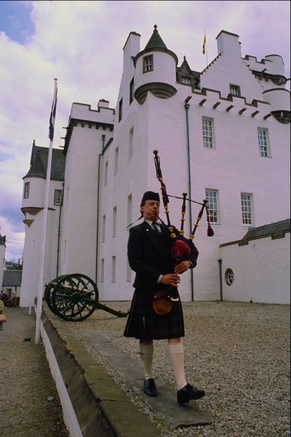 557067 Piper At Blair Atholl Castle, Scotland A4 Photo Print