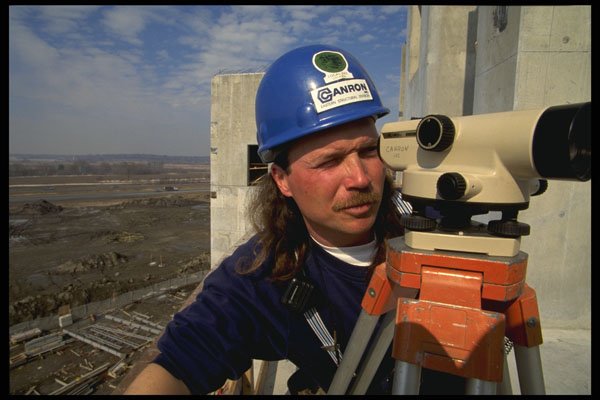 560023 Surveyor Hard At Work A4 Photo Print