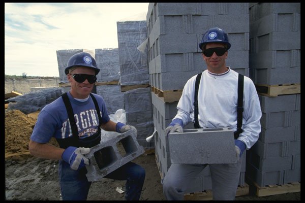 560029 Bricklayers Move The First Of 500,000 Blocks A4 Photo Print