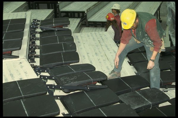 560053 Installing Retractable Seating A4 Photo Print