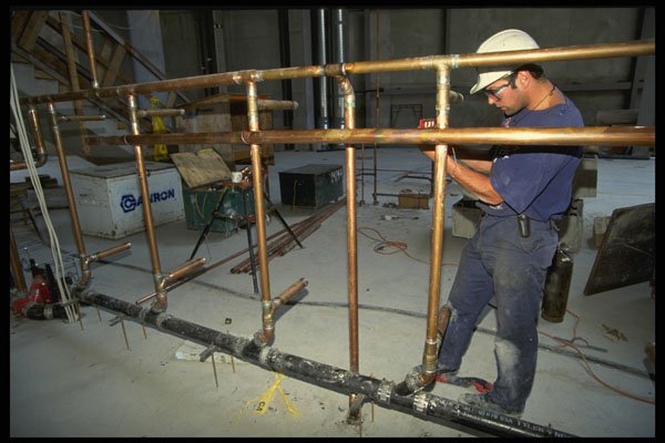 560068 Installing The Piping A4 Photo Print