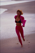 561007 Carrie Running On The Beach Wearing A Pink Suit, Jacket Open A4 Photo Print