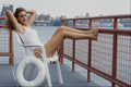561093 Beth Suns On The Balcony A4 Photo Print