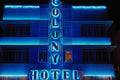 562081 Electric Blue Neons, Famed Colony Hotel A4 Photo Print