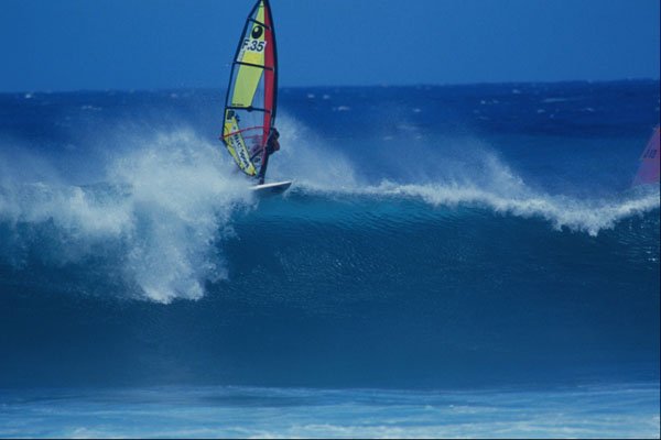 568036 Standing On The Lip Of The Wave, Hookipa With Teritehau A4 Photo Print