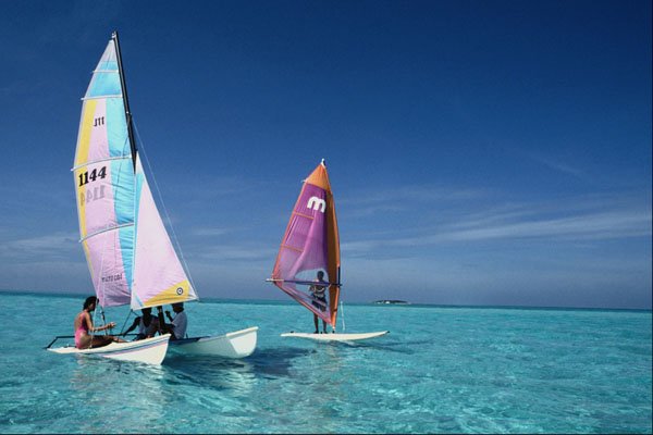 568067 Windsurfing And Catamaran In The Maldives Islands A4 Photo Print