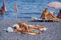 571017 Sun Worshippers, Santorini, Greece A4 Photo Print
