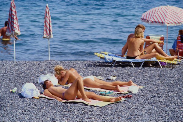 571017 Sun Worshippers, Santorini, Greece A4 Photo Print