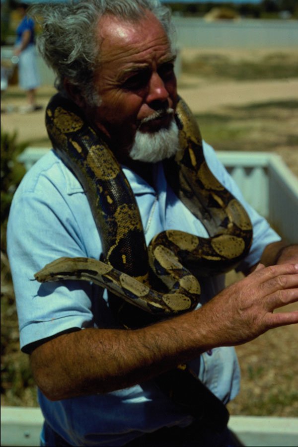 571018 Man With Snake, Crete, Greece A4 Photo Print