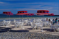 571024 Red Parasols On Beach, France A4 Photo Print