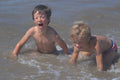 571037 Boys Playing In The Sea, France A4 Photo Print